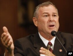 FILE - Rep. Dana Rohrabacher, R-Calif., testifies on Capitol Hill in Washington.
