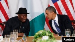 A craftsman fixes the statue of Hindu god Brahma after it was damaged during the deadly blast at the Erawan shrine in Bangkok, Thailand.