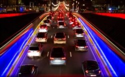 FILE - Cars sit at a standstill during morning rush hour on a main artery in the European Quarter of Brussels, Dec. 12, 2019. The European Union on July 14, 2021, unveiled new legislation to help meet its pledge to cut climate-changing emissions.