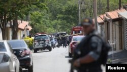 FILE - A police officer is seen in Campinas near Sao Paulo, Brazil, Oct. 17, 2019. 