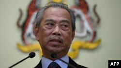 រូបឯកសារ៖ លោក​ Muhyiddin Yassin នាយក​រដ្ឋ​មន្ត្រី​ម៉ាឡេស៊ី ថ្លែង​សុន្ទរកថា នៅ​ការិយល័យ​នាយក​រដ្ឋ​មន្ត្រី កល​ពី​ខែ​មីនា ២០២០។