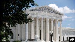FILE - The Supreme Court is seen on Capitol Hill in Washington, June 29, 2020.