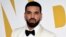 FILE - Canadian rapper Drake arrives at the NBA Awards in New York.