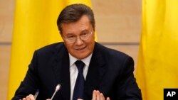 Ukraine's fugitive President Viktor Yanukovych gives a news conference in Rostov-on-Don, Friday, Feb. 28, 2014