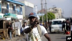 A man protests at the Lekki toll gate in Lagos, Nigeria, Oct. 21, 2020. 