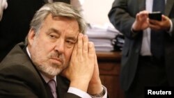 FILE - Senator Alejandro Guillier shown inside the Chilean congress in Valparaiso, Sept. 14, 2016.