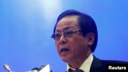 FILE - Vietnam's Presidential Office Vice Chairman Giang Son speaks at a news conference in Hanoi, Aug. 29, 2013. 