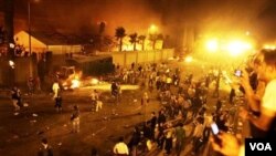 Kebakaran besar terlihat di sejumlah tempat di Kairo, termasuk di beberapa gedung pemerintah, Jumat (28/1).