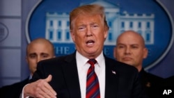 President Donald Trump speaks to reporters about border security in the briefing room of the White House