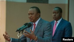 Presiden Kenya Uhuru Kenyatta bersama Menteri Dalam Negeri Fred Matiangi di Nairobi, Kenya, 14 Agustus 2017. (Foto: dok).