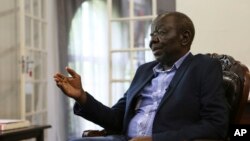 FILE - Zimbabwe's main opposition leader Morgan Tsvangirai stresses a point during an interview with the Associated Press at his home in Harare.