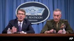 Defense Secretary Ash Carter, accompanied by Joint Chiefs Chairman Gen. Joseph Dunford, announces that U.S. forces killed a senior Islamic State leader, among several key members of the militant group eliminated this week, during a news conference at the Pentagon, March 25, 2016.