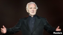 FILE - French singer Charles Aznavour performs during the Quebec Summer Festival, July 6, 2008. Aznavour has died at the age of 94, French media reported on Monday.