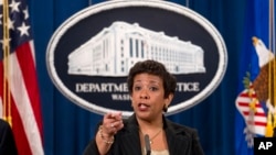 Attorney General Loretta Lynch speaks during a news conference at the Justice Department in Washington, Thursday, Dec. 3, 2015, to discuss the FIFA corruption case. 