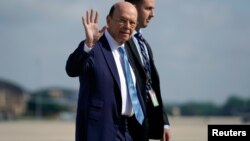 Secretary of Commerce Wilbur Ross boards Air Force One prior to departing Washington en route to Iowa from Joint Base Andrews, Maryland, July 26, 2018.