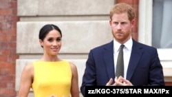 FILE - Prince Harry and Duchess Meghan are seen in a Jan. 9 2020, photo.