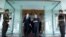 U.S. Secretary of State Antony Blinken, center right, walks with Afghanistan's Foreign Minister Mohammad Haneef Atmar, center left, at the presidential palace in Kabul, Afghanistan, April 51, 2021. 