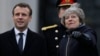 Macron, Theresa May Lakukan Pembicaraan di Inggris 