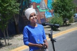 FILE - Democrat Rep. Ilhan Omar addresses the media in Minneapolis, Minnesota, Aug. 11, 2020.
