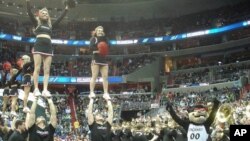 Pep Band Cheerleaders from University of Cincinnati at March Madness game at the Verizon Center in Washington, D.C.