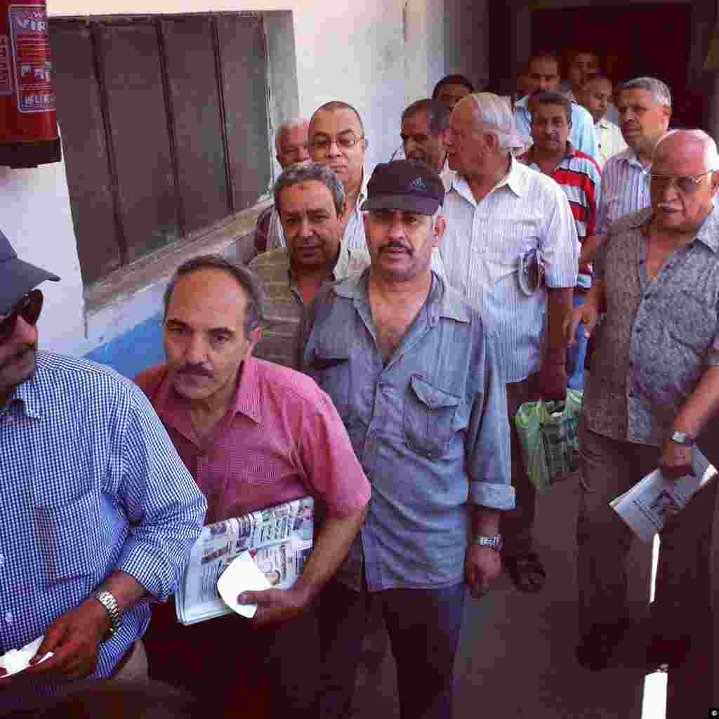 Egyptians line up to place their vote in their nation's presidential runoff in Cairo on June 16th, 2012.