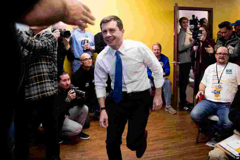 Democratic presidential candidate Pete Buttigieg arrives to speak at a campaign office the day of the Iowa caucuses, Feb. 3, 2020, in West Des Moines, Iowa. 