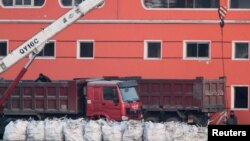 Maori warriors are seen during a welcome ceremony for Britain&#39;s Prince Harry and Meghan, Duchess of Sussex, at Government House in Wellington, New Zealand.