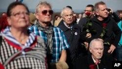 Buchenwald survivors, their relatives and others mark the 70th anniversary of the former Nazi concentration camp's liberation, April 11, 2015. It's a few miles from Weimar, Germany.