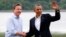 Britain's Prime Minister David Cameron (L) welcomes U.S. President Barack Obama on his arrival to the Lough Erne golf resort where the G8 summit is taking place in Enniskillen, Northern Ireland,l June 17, 2013. 