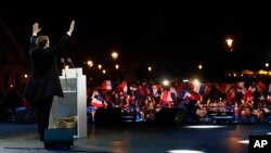 Incoming French President Emmanuel Macron delivers a speech in front of the Pyramid at the Louvre Museum in Paris, May 7, 2017.