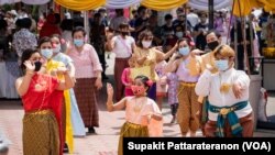 A group of Thai in Los Angeles performs a traditional dance during the Songkran Festival, Thai New Year Ceremony at Wat Thai Los Angeles Temple, Los Angeles, CA, April 11, 2021.
