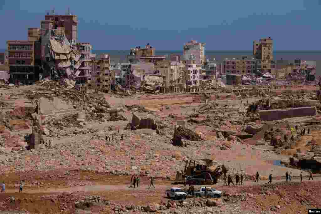 A view shows people inspecting the damaged areas, in the aftermath of the floods in Derna, Libya, Sept. 14, 2023.&nbsp;