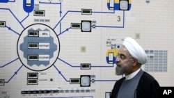 President Hassan Rouhani visits the Bushehr nuclear power plant just outside the port city of Bushehr, Iran, Jan. 13, 2015, in this photo released by the Iranian Presidency Office.