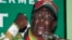 FILE: Zimbabwe's President Robert Mugabe gestures as he speaks to party supporters at the launch of his Presidential run-off campaign in the capital Harare May 25, 2008. 