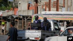 Police patrol the streets of downtown Port-au-Prince, Haiti, on Jan. 22, 2024. Six Roman Catholic nuns who were kidnapped about a week ago were released on Jan. 24.