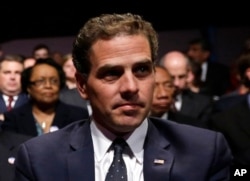FILE - Hunter Biden waits for the start of the his father's debate at Centre College in Danville, Kentucky, Oct. 11, 2012.