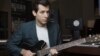 Mark Ronson poses for a photo at Jeff Bhasker Studio, in Venice, California.