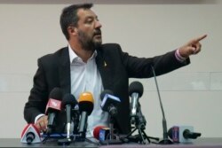 FILE - Italian Deputy Prime Minister and Interior Minister Matteo Salvini meets journalists at the end of a security conference in Castel Volturno, southern Italy, Aug. 15, 2019.
