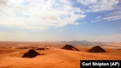 This undated photo provided by the Palaeodeserts Project in September 2021 shows the Jubbah Oasis in northern Saudi Arabia. (Ceri Shipton/Palaeodeserts Project via AP)