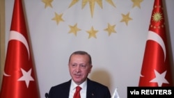 FILE - Turkish President Tayyip Erdogan takes part in a video conference during the G-20 Leaders' Summit 2020 hosted by Saudi Arabia, in Istanbul, Turkey, Nov. 21, 2020. (Presidential Press Office/Handout via Reuters)