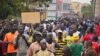 An opposition protest rally in a street of Ouagadougou, Burkina Faso. (Z. Wanogo/VOA). 