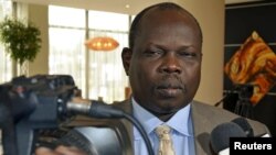 South Sudan's ruling Sudan People's Liberation Movement party secretary general Pagan Amum talks to the media during meeting with Sudan in Addis Ababa, Ethiopia, May 31, 2012. 