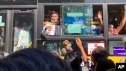 Prisoners released from Insein prison are welcomed by their colleagues and family members, in Yangon, Myanmar, Jan. 4, 2023. 