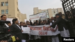 A woman shouts during a vigil in Abuja calling for the release of Nigerian schoolgirls abducted in the remote village of Chibok.