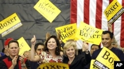 U.S. Secretary of Labor Hilda Solis, left, and U.S. Sen. Barbara Boxer, D-Calif. address get-out-the-vote volunteers at the International Association of Firefighters Local 1014, 31 Oct. 2010, in El Monte, California