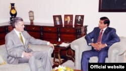 People take a tour in an &quot;upside down home&quot; in St. Petersburg, Russia. The exhibition charges less than $10 for a walk through three-room and two-bathroom house.