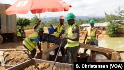 Workers separate gold without toxic chemicals such as mercury and arsenic in a formalized small-scale mining in southeastern Ghana, May 23, 2019.