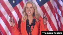 Former White House counselor Kellyanne Conway waves during a campaign event with U.S. first lady Melania Trump in Atglen, Pennsylvania.