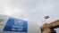 联合国近东巴勒斯坦难民救济和工程处(UNRWA)一辆卡车从加沙地带进入埃及。（路透社资料图）