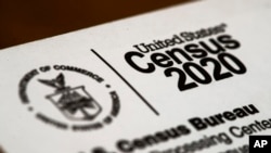 FILE - A March 19, 2020, photo shows a portion of an envelope containing a 2020 Census letter mailed to a U.S. resident in Glenside, Pennsylvania.